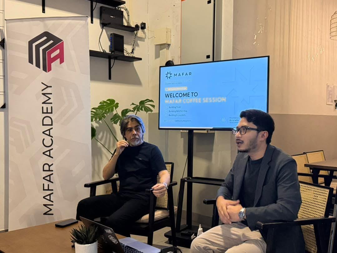 A fireside conversation on the Mafar Academy stage.